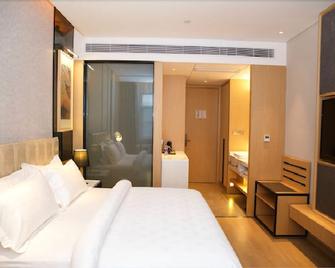 Jinjiang Metropolo Hotel Hangzhou Huanglong Wensan Road Branch - Hangzhou - Habitación