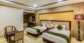 Treebo Trend Shivani - Indore - Bedroom