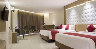 West Point Hotel - Bandung - Habitación