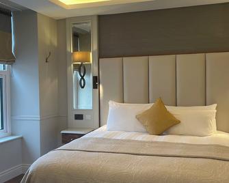 فندق غراند ترالي - ترالي - غرفة نوم