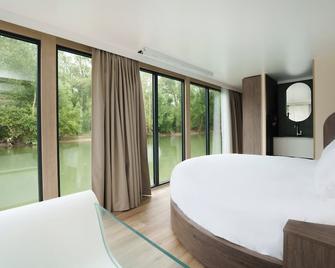 L'Escale Royale Poissy Île de Migneaux - Seine - Пуассі - Спальня