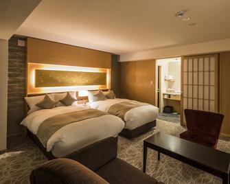 Kyoto Shinmachi Rokkaku Hotel grandereverie - Kyoto - Bedroom