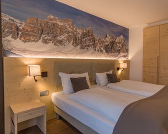 Hotel Villa Argentina - קורטינה ד'אמפצו - חדר שינה