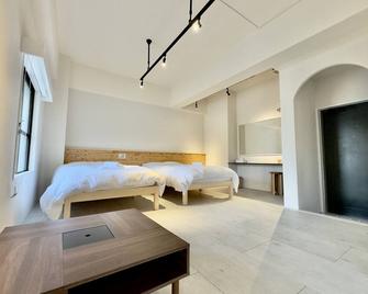 Hotel Ishigaki and Chikonkiya - Ishigaki - Slaapkamer