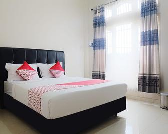 OYO 1426 Assyifa Hotel - Muarabungo - Habitación