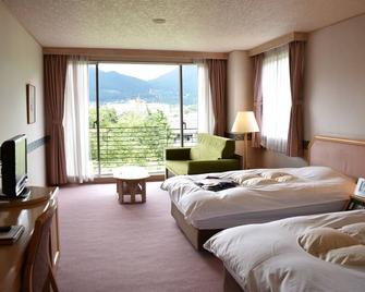 Yufuin Kotobuki Hananosho - Yufu - Schlafzimmer