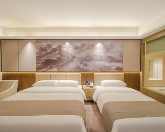 Wuyuan International Hotel - Jingdezhen - Bedroom
