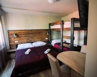 Ötösfogat Panzió - Siófok - Bedroom