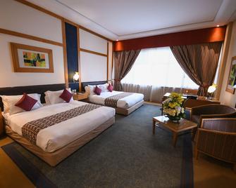 Juffair Grand Hotel - מאנאמה - חדר שינה