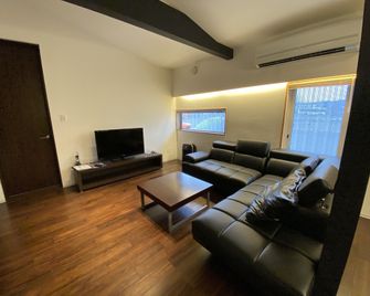 Furano Natulux Hotel - Furano - Wohnzimmer