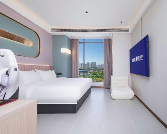 Aka Boundless Esports Hotel (Jingzhou Wanda Branch) - Jingzhou - Schlafzimmer
