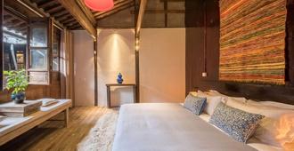 Guzo Su The Old House Boutique Hotel - Huangshan - Bedroom