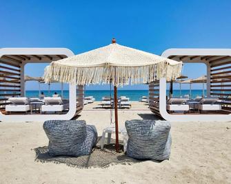 Hotel Evilion Sea And Sun - Neoi Poroi - Strand
