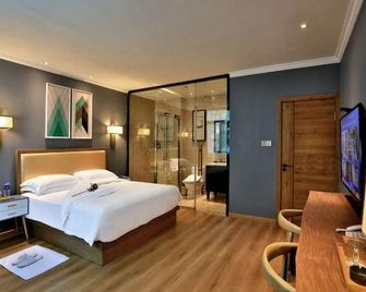 Oriental Hotel - Jinhua - Schlafzimmer