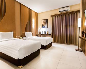 Lynt Hotel Jakarta - Yakarta - Habitación