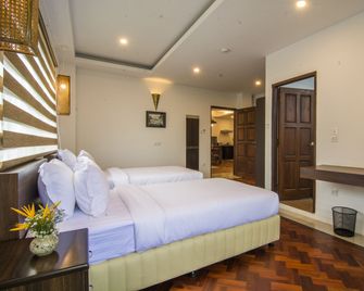 Woodside Inn & Serviced Apartments - Rangún - Habitación
