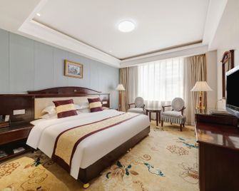 Ruicheng Hotel China - يونتشنغ - غرفة نوم