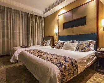 Huangguan Hotel - Zaozhuang - Bedroom