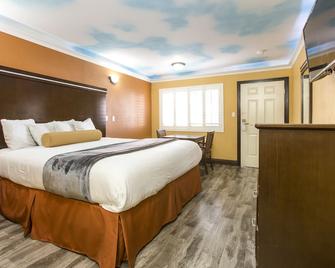 Hollywood Palms Inns & Suites - לוס אנג'לס - חדר שינה