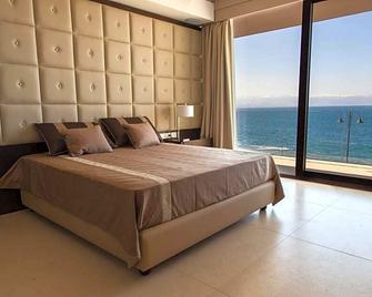 Ngonia Bay Boutique Hotel - Milazzo - Спальня