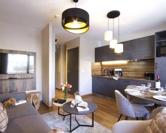 Appart'Hôtel Prestige Odalys L'Eclose - Huez - Sala de estar