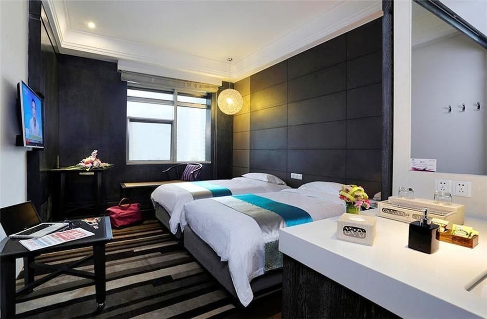 Herton Garden Hotel - קונמינג - חדר שינה