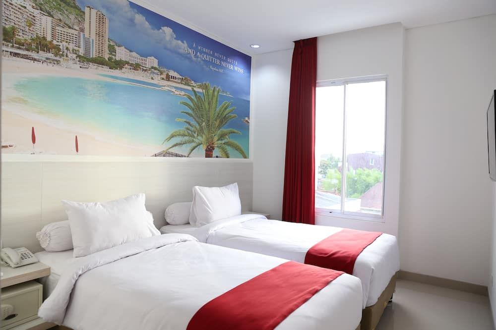 فندق ذا وين - سورابايا - غرفة نوم