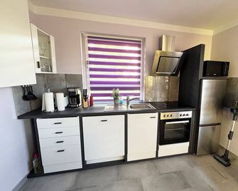 Vacation apartment (55sqm) with sun terrace in Frickenhausen - Frickenhausen am Main - Cocina