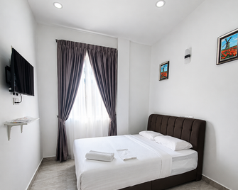 Srg Indira Hotel - Gelang Patah - Ložnice