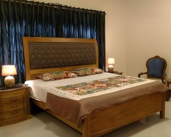 Hotel Inn Karachi - Karachi - Habitación