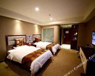 Mingdianxiangrui Hotel - Liangshan - Slaapkamer