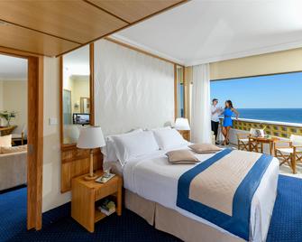 Constantinou Bros Athena Royal Beach Hotel - Pafos - Makuuhuone