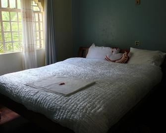 Tranquil Homestays - Naro Moru - Camera da letto