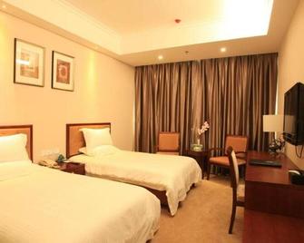 Greentree Inn Shanxi Jinzhong Jiexiu Railway Station Express Hotel - Jinzhong - Soverom