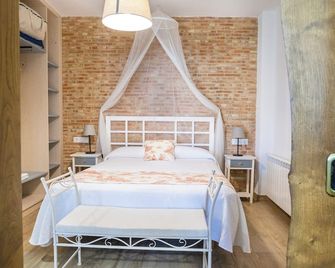Apartamentos rurales Posada de Monfragüe con jacuzzi - Malpartida de Plasencia - Phòng ngủ
