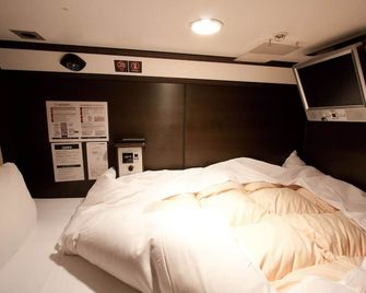 Hearts Capsule Hotel & Spa Nakasu -Male Only- - Fukuoka - Ložnice