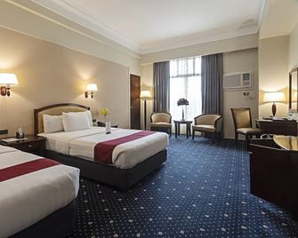 Sarrosa International Hotel and Residential Suites - Cebu City - Bedroom