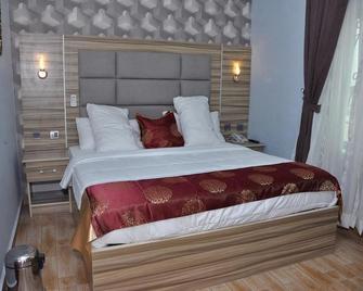 Mozida Suites - Kano - Camera da letto