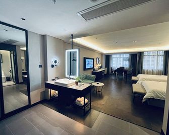 Xana Hotelle (Fuzhou Show Time Jinchao Shiyan Xuexiao) - Fuzhou - Bedroom