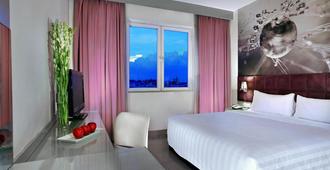 Royal Palm Hotel & Conference Center Cengkareng - Jakarta - Phòng ngủ