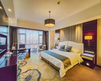 Xinghewan International Hotel - Yancheng - Bedroom