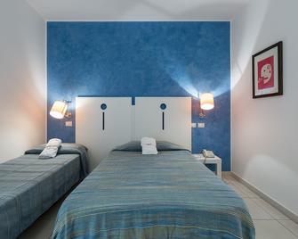 Silver Hotel - Le Triple - Matino - Schlafzimmer