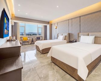 Magnotel Dandong Tianci Future City Jinshan Avenue - Dandong - Schlafzimmer
