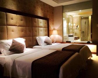 Xinhua Jianguo Hotel - Jiujiang - Bedroom