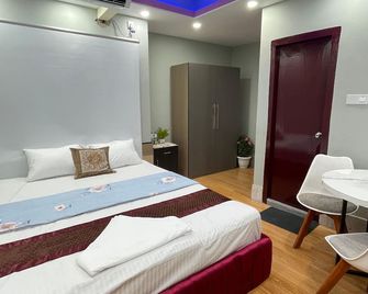Hotel Family Inn - Dháka - Ložnice