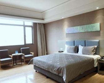 M Hotel (Dongguan Haichao) - Đông Hoản - Phòng ngủ