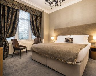 Howbeck Guest House - ווינדרמר - חדר שינה