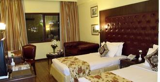 ホテル リッツ プラザ - アムリトサル - 寝室