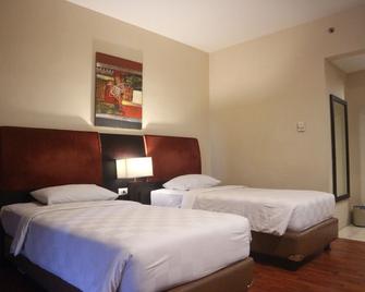 Hotel Grand Anugerah - Bandar Lampung - Soveværelse