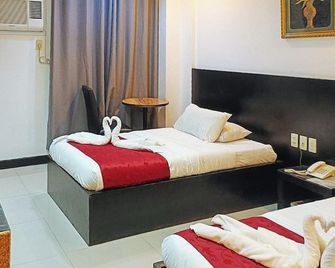 Check Inn Hotel Dumaguete City by RedDoorz - Dumaguete City